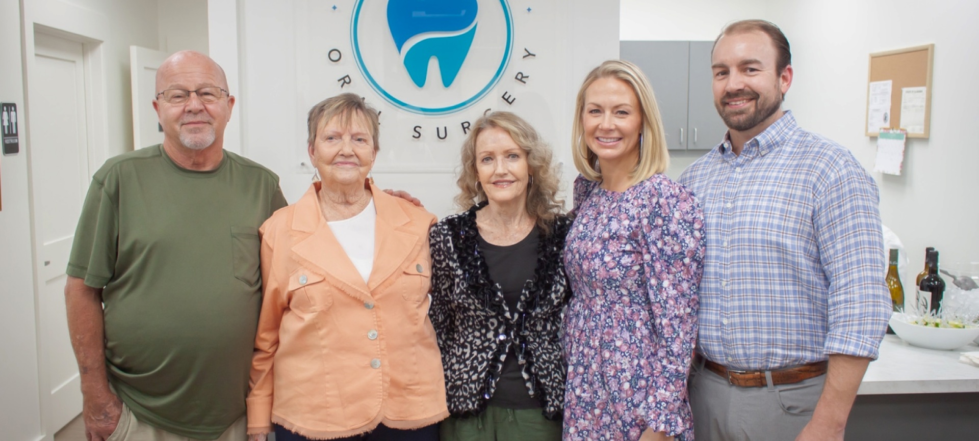 Dr. Babston and friends posing for a photo in the office.